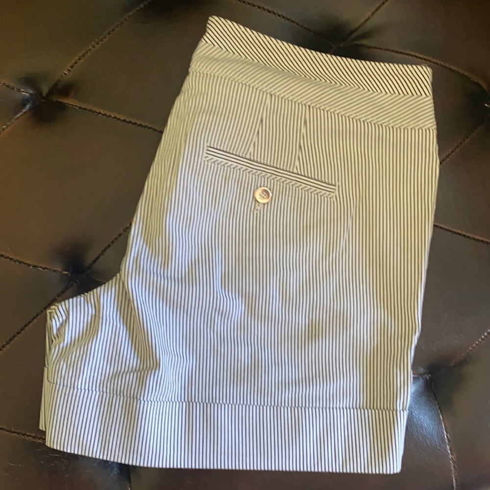 Never worn, black striped shorts